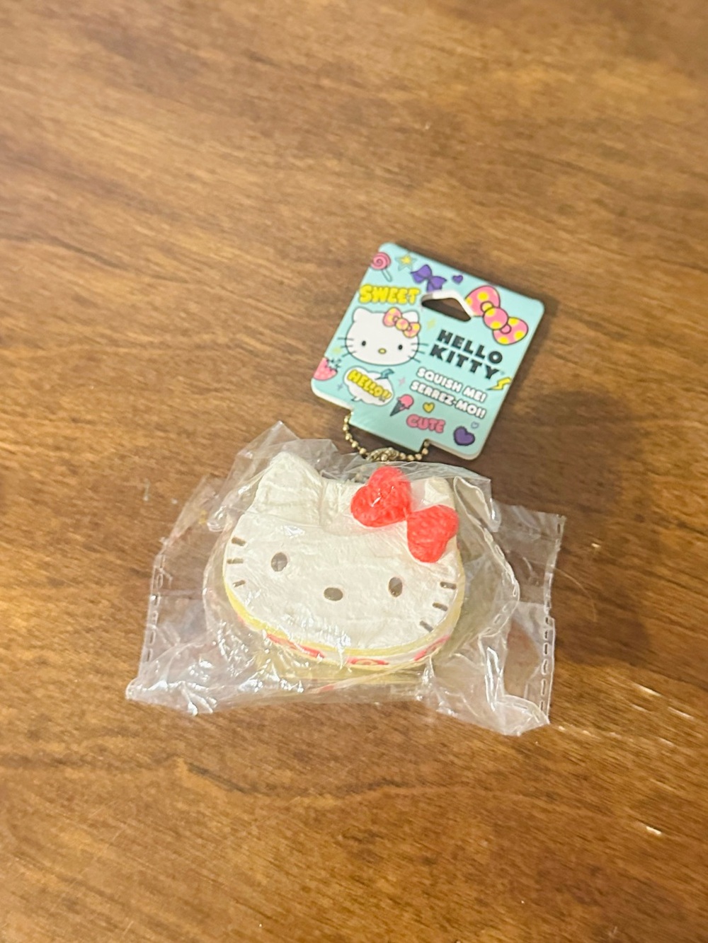Sanrio Hello Kitty Yellow Macaron Squishy Keychain with Gold Chain